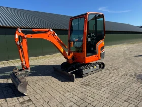 Багер Kubota KX016