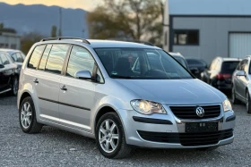 VW Touran 1.9TDi 105к.с 6ск. * Климатроник* * Навигация*  - Car24.bg VW Touran 1.9TDi 105к.с 6ск. * Климатроник* * Навигация*