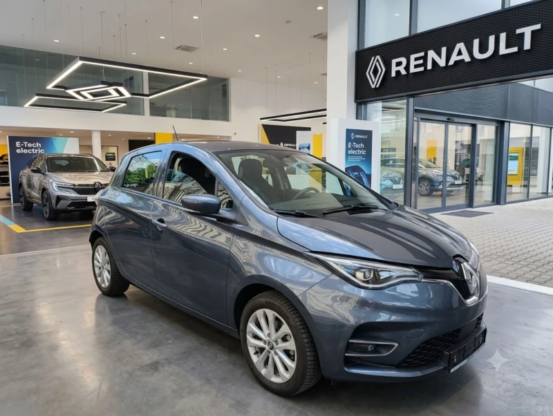 Renault Zoe 52kWh_Кам_Пр./Зад.паркт_Климатр.SoH95%Сертификат - 14490 € / 28339.98 лв. - 25979480 1 | Car24.bg Renault Zoe 52kWh_Кам_Пр./Зад.паркт_Климатр.SoH95%Сертификат - 14490 € / 28339.98 лв. - 25979480 1