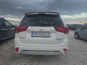 Mitsubishi Outlander 2.5, Plug Hibrid, 4WD, Top - 29700 лв. / 15185.37 € - 79037312 8 | Car24.bg Mitsubishi Outlander 2.5, Plug Hibrid, 4WD, Top - 29700 лв. / 15185.37 € - 79037312 8