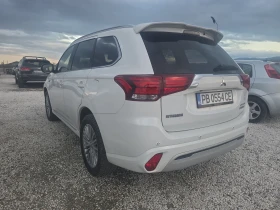 Mitsubishi Outlander 2.5, Plug Hibrid, 4WD, Top - 29700 лв. / 15185.37 € - 79037312 11 | Car24.bg Mitsubishi Outlander 2.5, Plug Hibrid, 4WD, Top - 29700 лв. / 15185.37 € - 79037312 11