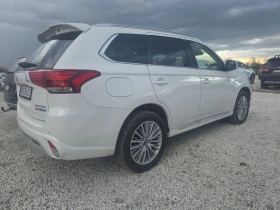 Mitsubishi Outlander 2.5, Plug Hibrid, 4WD, Top - 29700 лв. / 15185.37 € - 79037312 9 | Car24.bg Mitsubishi Outlander 2.5, Plug Hibrid, 4WD, Top - 29700 лв. / 15185.37 € - 79037312 9