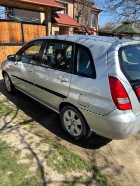 Suzuki Liana 1.6 4x4 - 1300 € / 2542.58 лв. - 39943914 4 | Car24.bg Suzuki Liana 1.6 4x4 - 1300 € / 2542.58 лв. - 39943914 4