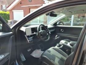 Hyundai Ioniq 5 77.4kw/4х4/UNIQ/Гаранция/360/HeadUp/BOSE - 29700 € - 79933702 5 | Car24.bg Hyundai Ioniq 5 77.4kw/4х4/UNIQ/Гаранция/360/HeadUp/BOSE - 29700 € - 79933702 5