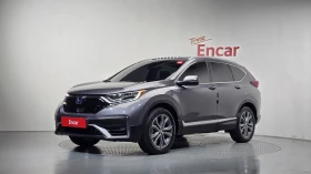 Honda Cr-v Hybrid Touring 4WD - Car24.bg Honda Cr-v Hybrid Touring 4WD