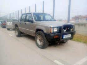 Mitsubishi L200 L200 - 3800 € / 7432.15 лв. - 77584110 2 | Car24.bg Mitsubishi L200 L200 - 3800 € / 7432.15 лв. - 77584110 2