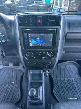 Suzuki Jimny 1.5DCI 85kc KLIMA FACE TOPPP | Auto.bg — изображение 12 Suzuki Jimny 1.5DCI 85kc KLIMA FACE TOPPP | Auto.bg — изображение 12