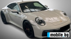     Porsche 911 992 Carr... ~ 272 999 .