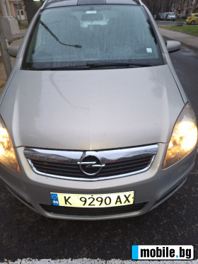     Opel Zafira ~5 500 .