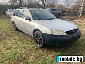     Ford Mondeo 2.0i ~2 100 .