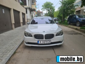     BMW 740 ~27 500 .