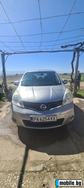     Nissan Note 1.4 ~7 700 .