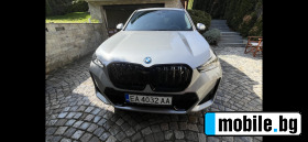     BMW iX 1 XDrive 30 ~ 115 900 .