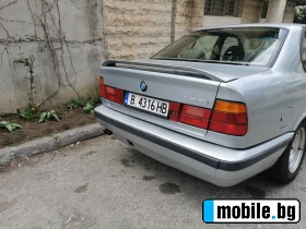     BMW 520 E34 ~7 000 .