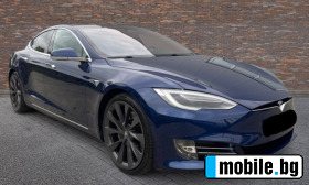     Tesla Model S S100D + ... ~69 000 .