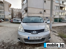     Nissan Note 1.4i 88 / ~7 000 .
