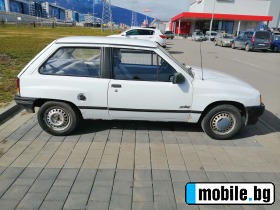 Opel Corsa 1.4 | Mobile.bg   3