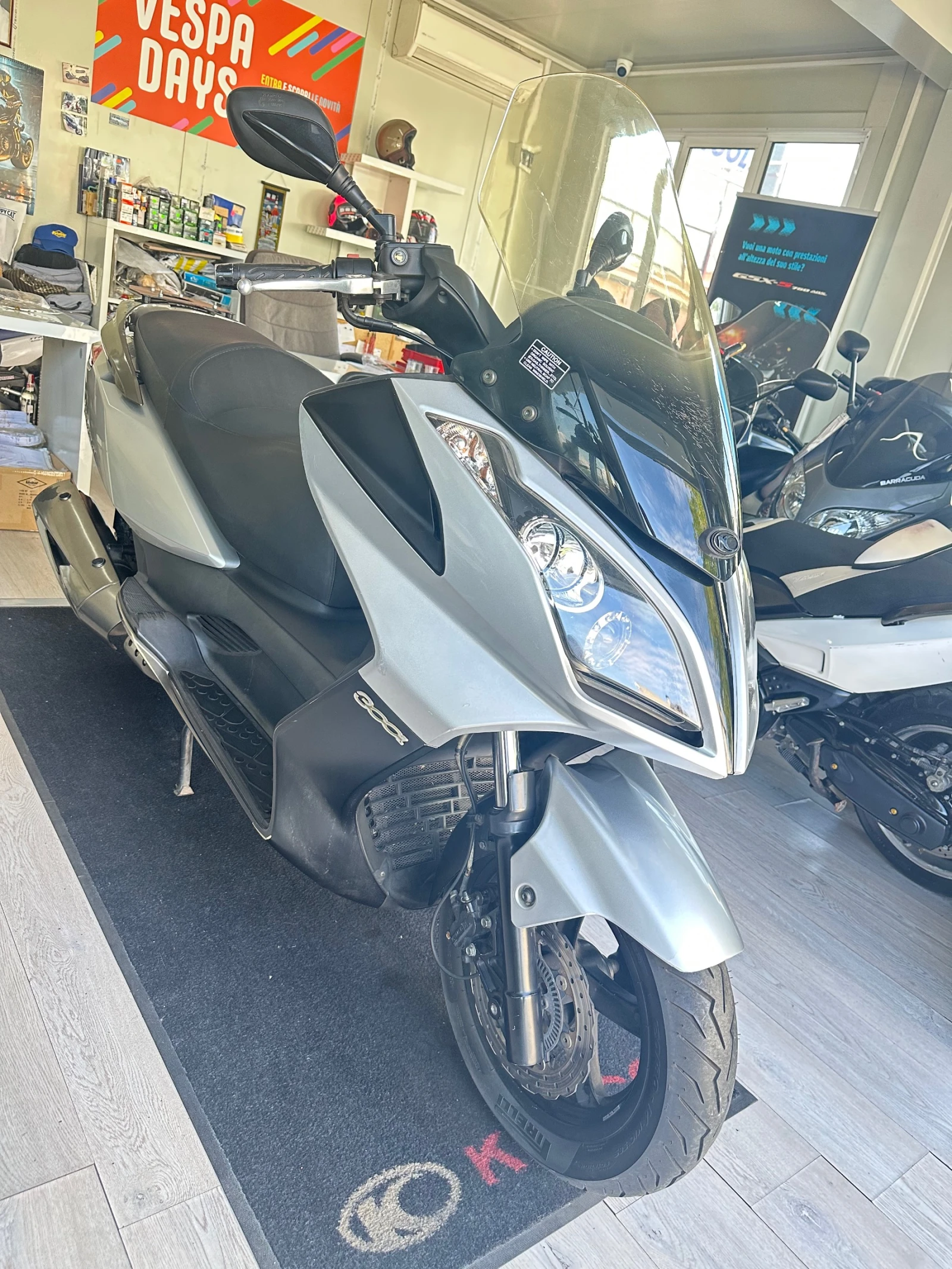 Kymco Downtown 300i 2009г. - изображение 8