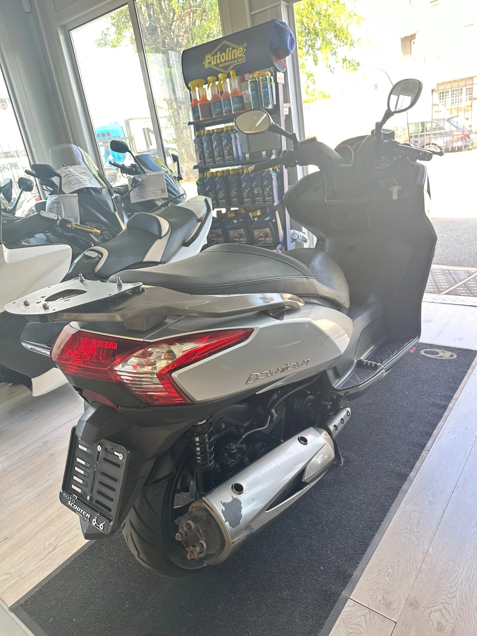 Kymco Downtown 300i 2009г. - изображение 9