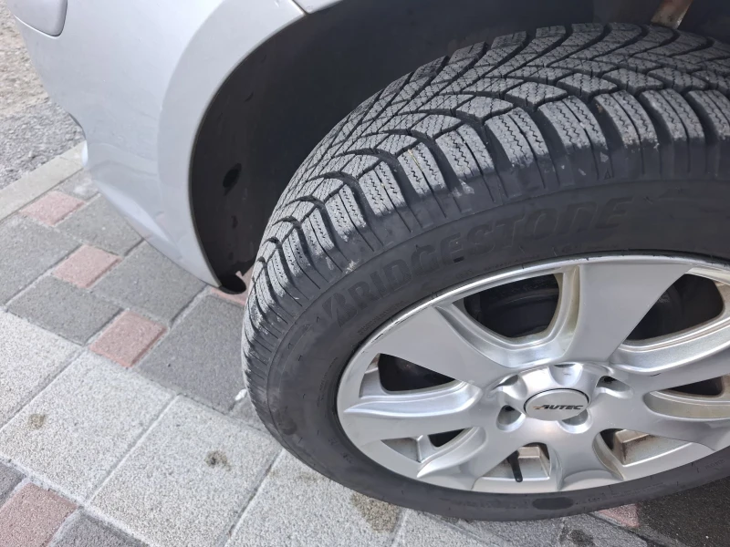 VW Touran 1.9TDI-105ps.Навигация , снимка 15 - Автомобили и джипове - 52604718