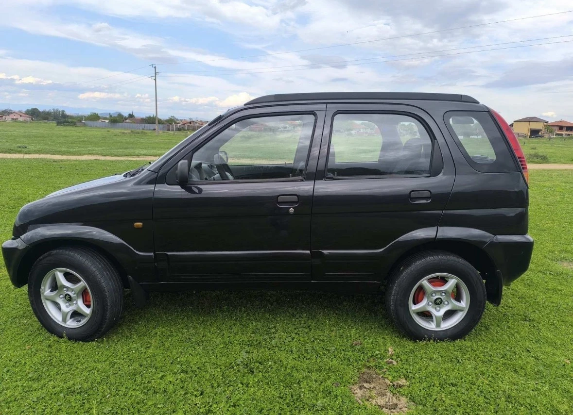 Daihatsu Terios 1.3i, снимка 3 - Автомобили и джипове - 55139657