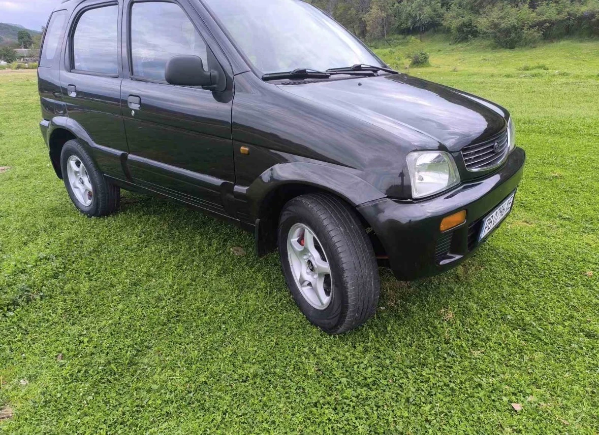 Daihatsu Terios 1.3i, снимка 2 - Автомобили и джипове - 55139657