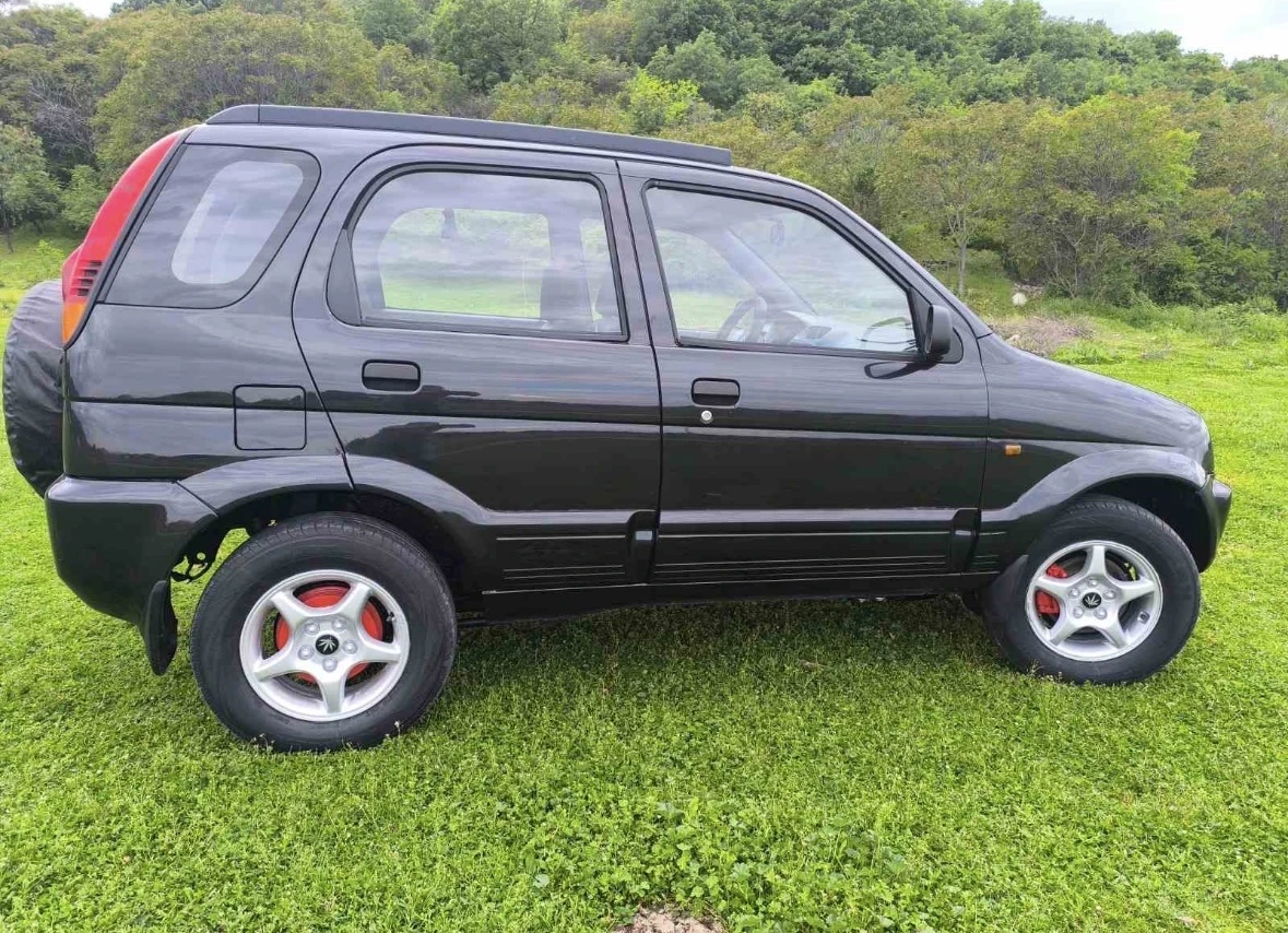 Daihatsu Terios 1.3i, снимка 4 - Автомобили и джипове - 55139657