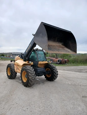 Обява за продажба на Телескопичен товарач New Holland LM410 ~49 200 лв. - изображение 4