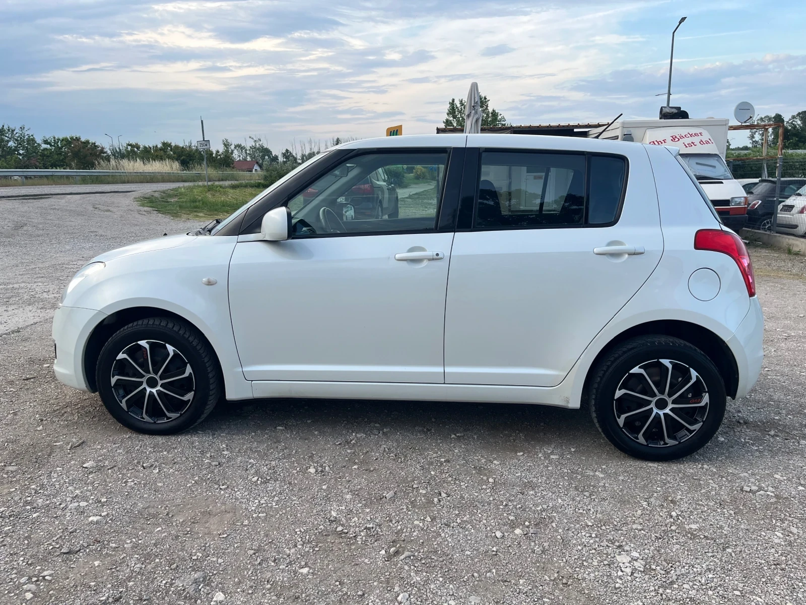 Suzuki Swift 1.3i-90-4x4-FEIS-ITALIA, снимка 12 - Автомобили и джипове - 54745583