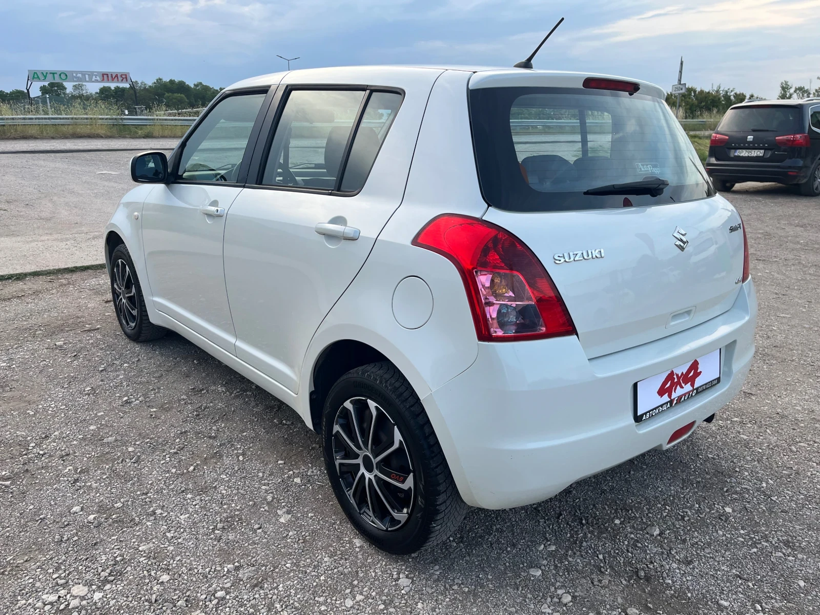 Suzuki Swift 1.3i-90-4x4-FEIS-ITALIA, снимка 11 - Автомобили и джипове - 54745583