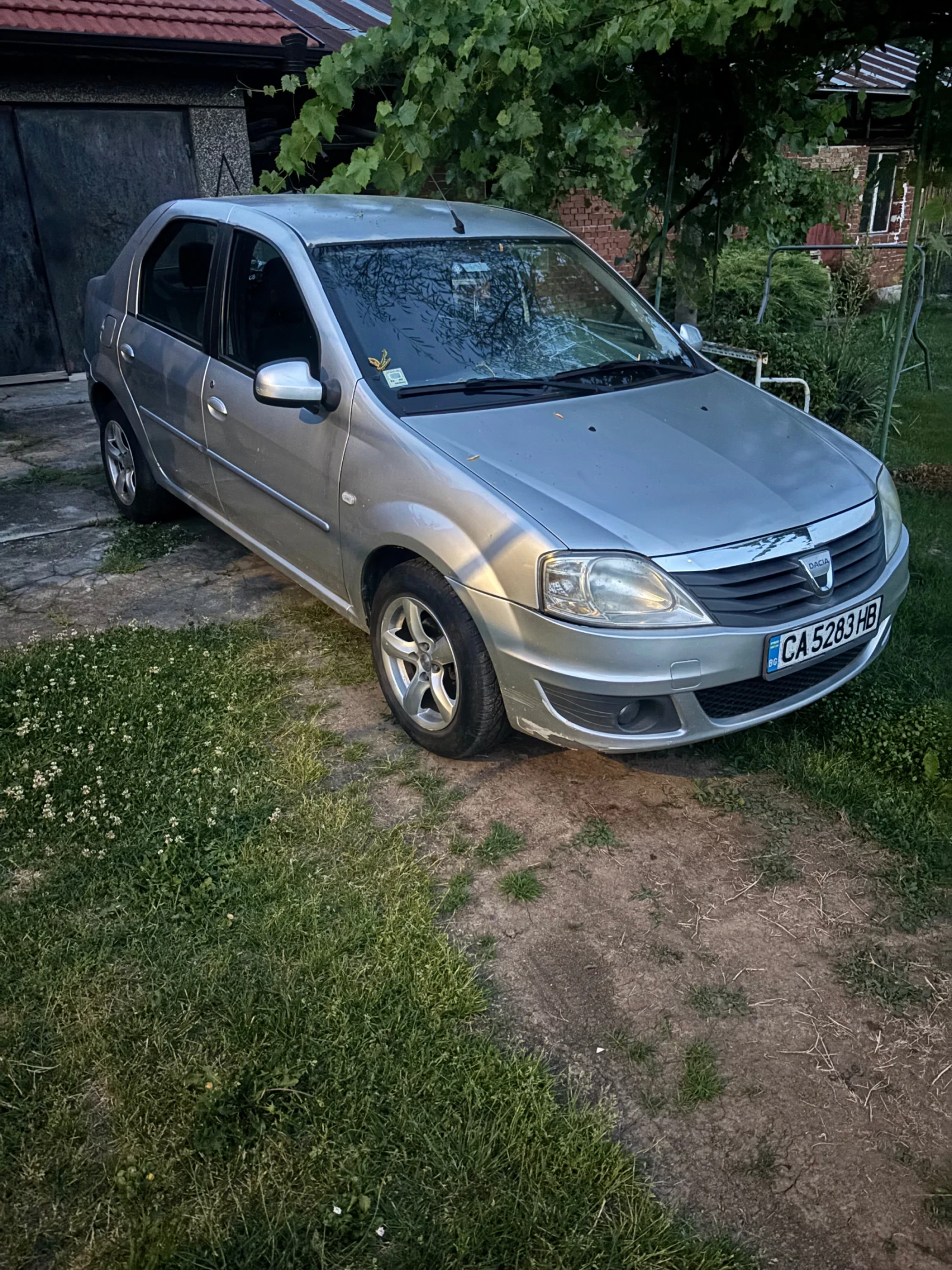 Dacia Logan 1.6 16V, снимка 7 - Автомобили и джипове - 55967568