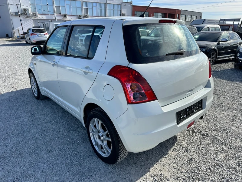 Suzuki Swift 1.3 i 4WD, снимка 6 - Автомобили и джипове - 48029735