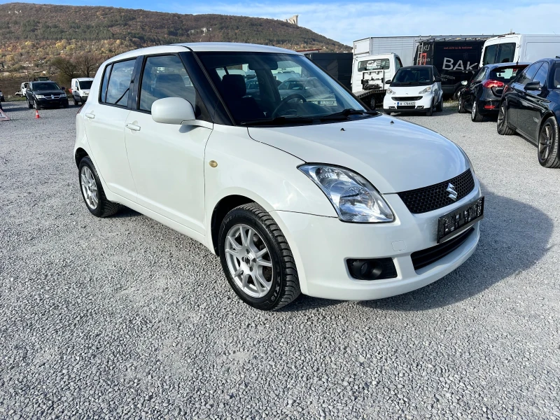 Suzuki Swift 1.3 i 4WD, снимка 1 - Автомобили и джипове - 48029735