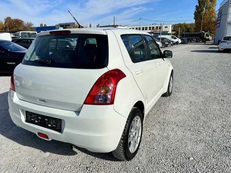 Suzuki Swift 1.3 i 4WD, снимка 2 - Автомобили и джипове - 48029735