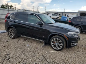 BMW X5 4.4l xDrive50I, снимка 4