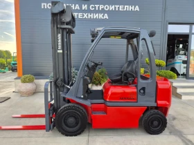 Мотокар Nissan 2.5 тона / ДИЗЕЛ / ИЗРАВНИТЕЛ / 4.50 височина, снимка 2