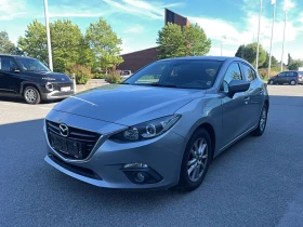 ������ Mazda 3