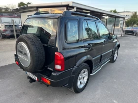     Suzuki Grand vitara 2.0i 128.  
