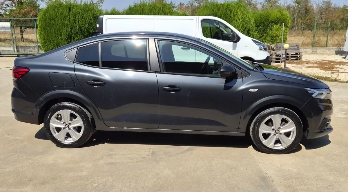 Dacia Logan, снимка 4 - Автомобили и джипове - 56001903