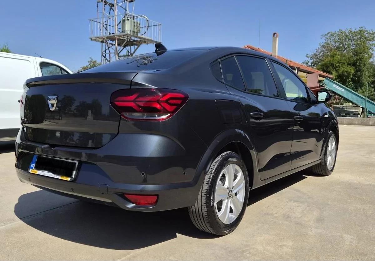 Dacia Logan, снимка 7 - Автомобили и джипове - 56001903