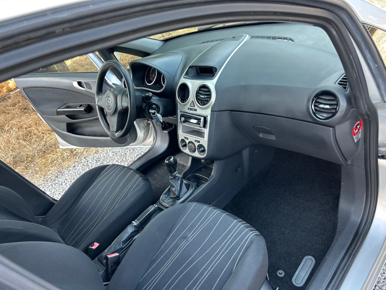 Opel Corsa 1.2I 16V EURO4, снимка 15 - Автомобили и джипове - 54863981