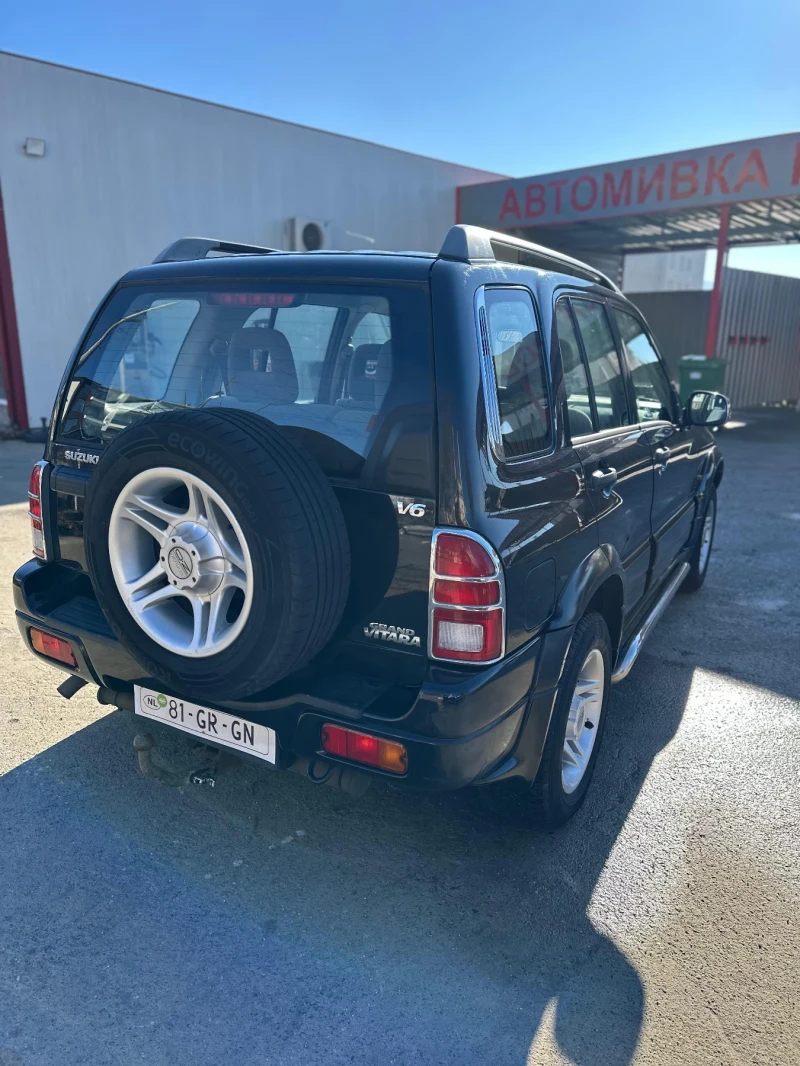 Suzuki Grand vitara, снимка 13 - Автомобили и джипове - 48510401