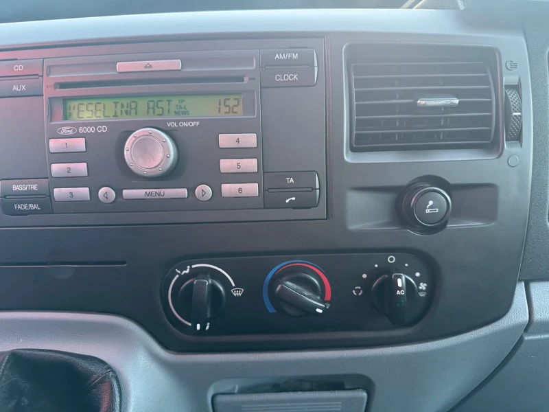 Ford Transit 2.4TDCI Климатик Тристранен, снимка 11 - Бусове и автобуси - 52320525