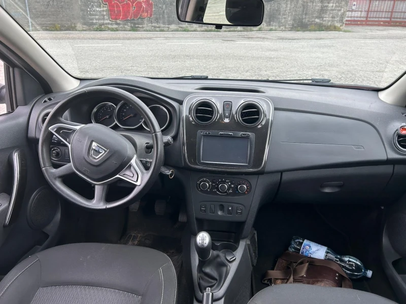 Dacia Logan 1.5D..90 КС..НАВИ..КЛИМАТИК, снимка 12 - Автомобили и джипове - 47266429