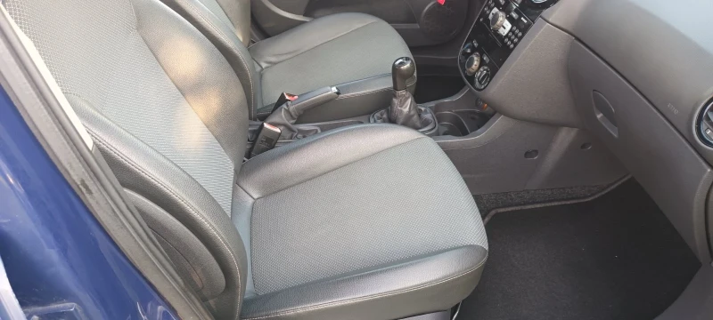 Opel Corsa 1.2 кожен салон 91000, снимка 11 - Автомобили и джипове - 52396529