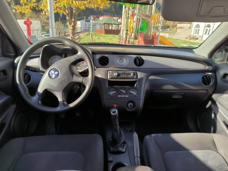 Mitsubishi Outlander 2.0 Газ 4*4, снимка 8 - Автомобили и джипове - 46900756