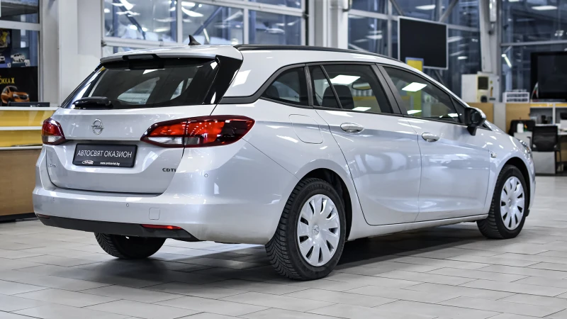 Opel Astra Sports Tourer 1.6d Edition Automatic, снимка 6 - Автомобили и джипове - 52739828