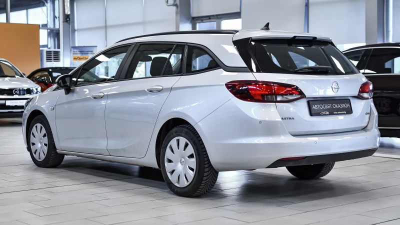 Opel Astra Sports Tourer 1.6d Edition Automatic, снимка 7 - Автомобили и джипове - 52739828