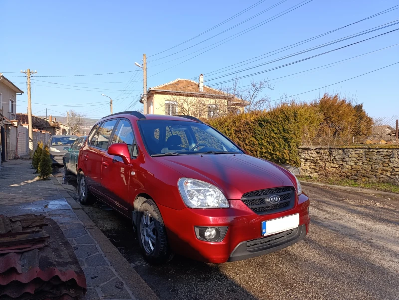 Kia Carens 2.0i, снимка 4 - Автомобили и джипове - 48729762