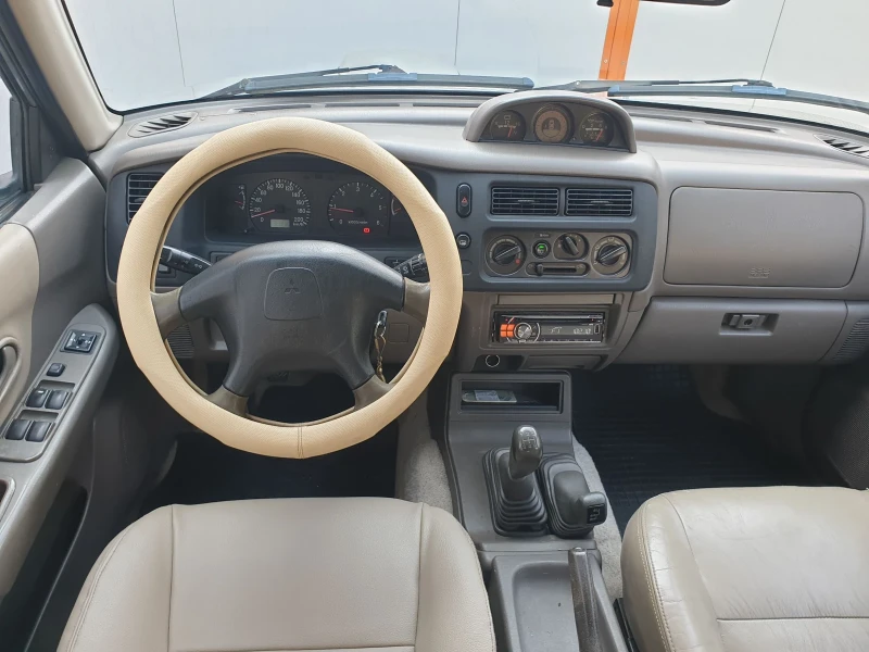 Mitsubishi Pajero sport 2, 5 TDi Климатик , снимка 11 - Автомобили и джипове - 47303083